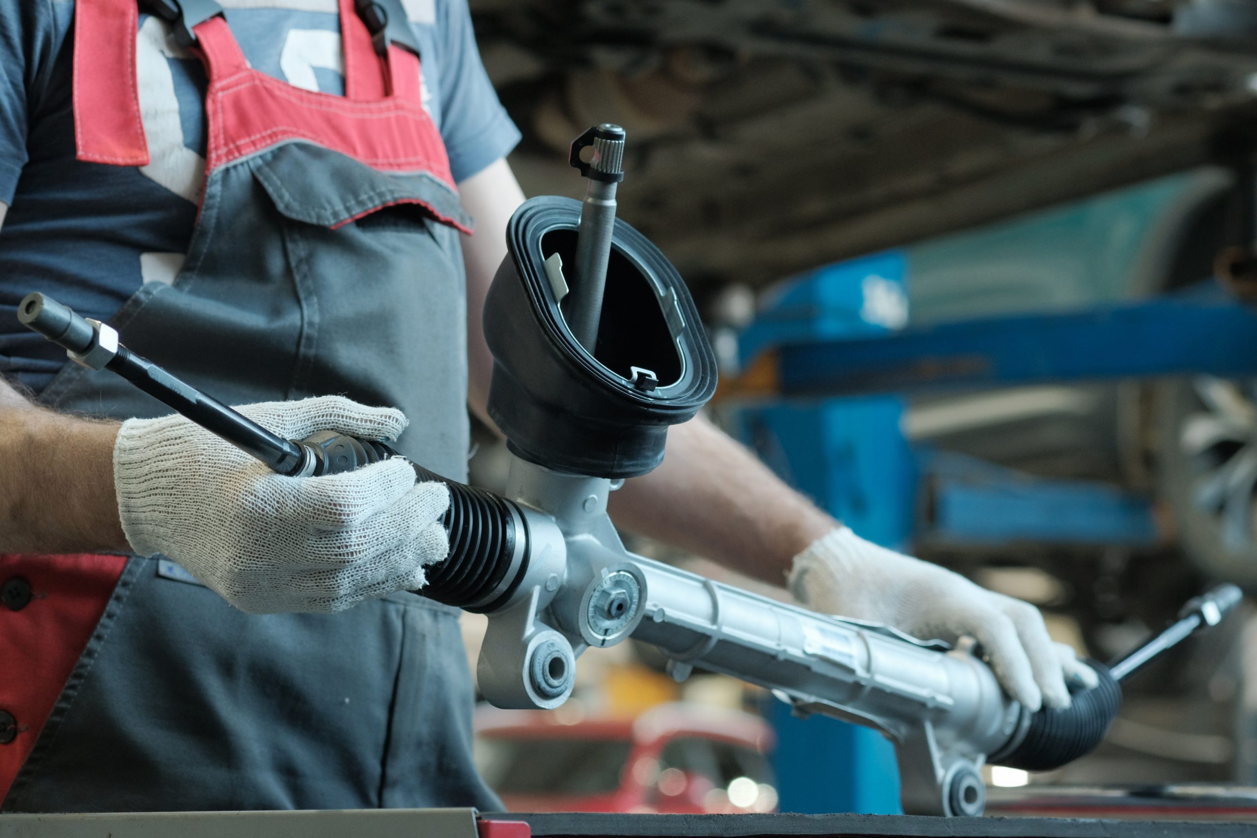 The,Steering,Rack,Is,In,The,Hands,Of,An,Auto